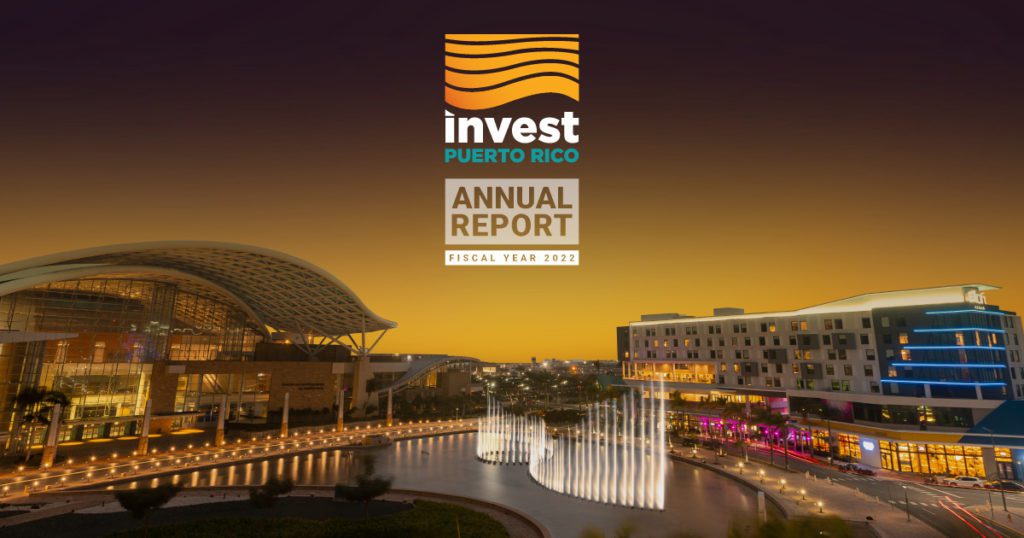 Photo of the Puerto Rico Convention Center and the Aloft Hotel in Distrito T-Mobile with an overlay graphic including InvestPR's logo and the text Annual Report Fiscal Year 2022